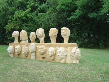 sculptured heads in concrete
